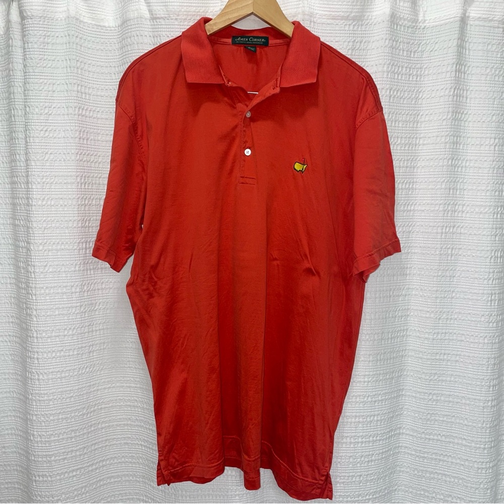 Red/orange Master’s polo